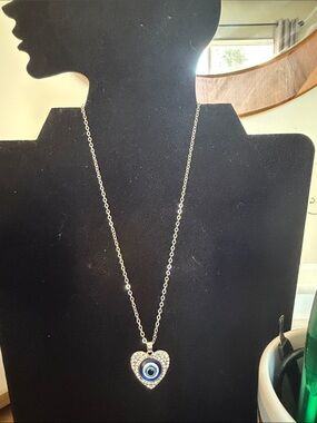 Silver Heart Pendant Necklace with Blue Evil Eye Accent